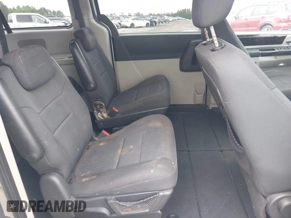 2010 Dodge Grand Caravan SXT z VIN 2D4RN5D18AR247124, wystawiony jako IAAI lot #42257538 z przebiegiem 197 443 mil mil oraz . Historia ofert i sprzedaży dostępna na DreamBid. Obrazek 8.