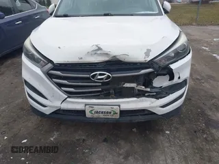 2017 Hyundai Tucson SE with VIN KM8J23A49HU297707, listed as a IAAI auction lot 41257353 with 164,687 mi miles. Bid and sale history available at carsss.com. Image 6.