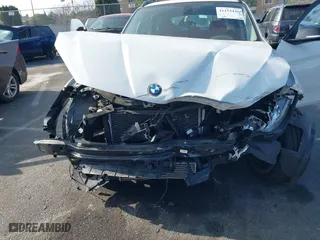 2014 BMW X1 xDrive28i with VIN WBAVL1C52EVY23658, listed as a IAAI auction lot 41153436 with 26,791 mi miles. Bid and sale history available at carsss.com. Image 6.