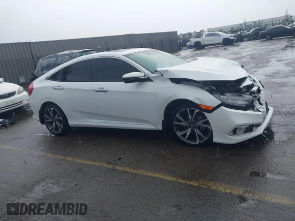 2020 Honda Civic Sedan Touring with VIN 19XFC1F91LE210390, listed as a IAAI auction lot 41766652 with 67,269 mi miles. Bid and sale history available at carsss.com. Image 13.