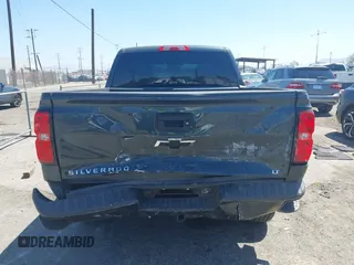 2018 Chevrolet Silverado 1500 LT with VIN 3GCUKREC1JG511846, listed as a IAAI auction lot 42024170 with 121,532 mi miles and . Bid and sale history available at DreamBid. Image 6.