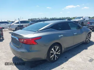 2016 Nissan Maxima SL with VIN 1N4AA6AP9GC901494, listed as a IAAI auction lot 42023106 with 160,581 mi miles and . Bid and sale history available at DreamBid. Image 4.