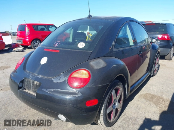 2005 Volkswagen New Beetle Coupe GLS with VIN 3VWCK31C45M404762, listed as a IAAI auction lot 41428782 with 135,706 mi miles. Bid and sale history available at carsss.com. Image 4.