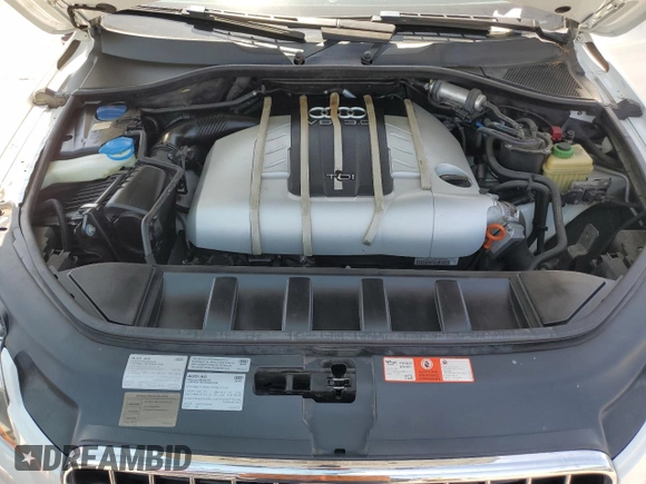 2010 Audi Q7 Prestige with VIN WA1WMAFE9AD005130, listed as a Copart auction lot 63524715 with 127,823 mi miles and Salvage title. Bid and sale history available at DreamBid. Image 12.