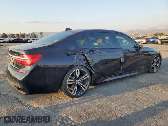 2017 BMW 7 Series 750i with VIN WBA7F0C57HGM21136, listed as a Copart auction lot 88525335 with 102,508 mi miles and Salvage title. Bid and sale history available at DreamBid. Image 3.