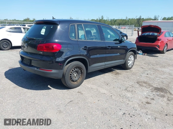 2017 Volkswagen Tiguan S with VIN WVGAV7AX5HK048843, listed as a IAAI auction lot 42029583 with 73,892 mi miles and . Bid and sale history available at DreamBid. Image 4.