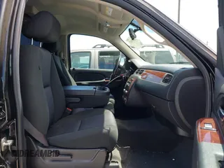 2013 Chevrolet Tahoe LS with VIN 1GNSCAE04DR104790, listed as a IAAI auction lot 42225652 with 119,948 mi miles and . Bid and sale history available at DreamBid. Image 5.