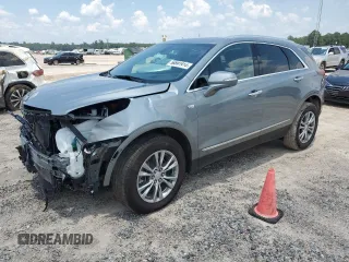 2023 Cadillac XT5 FWD Premium Luxury with VIN 1GYKNCRS3PZ135585, listed as a Copart auction lot 58891914 with 32,325 mi miles and Salvage Title. Bid and sale history available at carsss.com. Image 1.