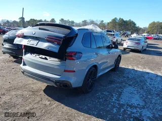 2025 BMW X5 M60i with VIN 5UX33EU08S9X68091, listed as a IAAI auction lot 41246321 with 10 mi miles. Bid and sale history available at carsss.com. Image 4.