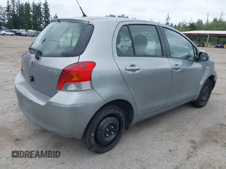 2010 Toyota Yaris z VIN JTDKT4K36A5290179, wystawiony jako IAAI lot #42515432 z przebiegiem 101 224 mil mil oraz . Historia ofert i sprzedaży dostępna na DreamBid. Obrazek 4.