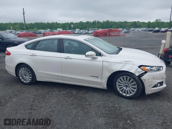 2014 Ford Fusion SE Hybrid с VIN 3FA6P0LUXER125766, выставлен на аукционе IAAI как лот 42178177 с пробегом 284 385 миль миль и . История ставок и продаж доступна на DreamBid. Изображение 13.