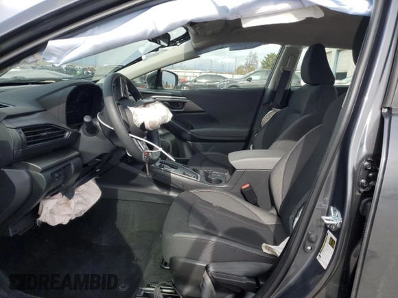 2024 Subaru Impreza with VIN JF1GUABCXR8886106, listed as a Copart auction lot 49258025 with 5,600 mi miles and Salvage title. Bid and sale history available at DreamBid. Image 7.