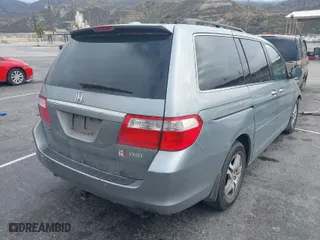 2007 Honda Odyssey Touring with VIN 5FNRL38847B112242, listed as a IAAI auction lot 41772442 with 211,753 mi miles. Bid and sale history available at carsss.com. Image 4.