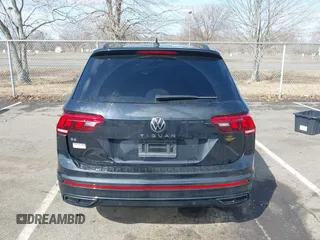 2023 Volkswagen Tiguan SE R-Line Black with VIN 3VVCB7AXXPM094621, listed as a IAAI auction lot 41737103 with 21,069 mi miles and . Bid and sale history available at DreamBid. Image 16.