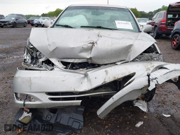 2003 Toyota Camry LE with VIN 4T1BE32K63U755835, listed as a IAAI auction lot 41976402 with 215,788 mi miles and . Bid and sale history available at DreamBid. Image 13.