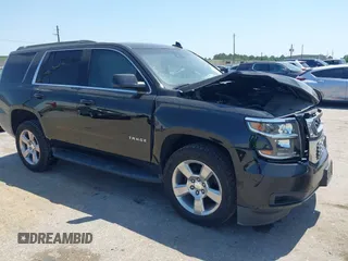 2020 Chevrolet Tahoe LS z VIN 1GNSCAKCXLR293278, wystawiony jako IAAI lot #41973191 z przebiegiem 61 907 mil mil oraz . Historia ofert i sprzedaży dostępna na DreamBid. Obrazek 1.