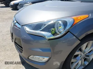 2012 Hyundai Veloster w/Black Int with VIN KMHTC6AD5CU030788, listed as a IAAI auction lot 42774337 with 104,297 mi miles and . Bid and sale history available at DreamBid. Image 6.