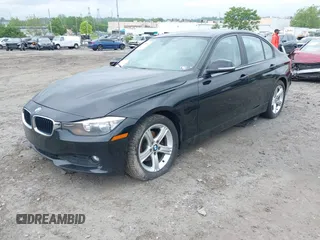 2014 BMW 3 Series 328d xDrive with VIN WBA3D5C50EKX97932, listed as a IAAI auction lot 42255047 with 169,617 mi miles and . Bid and sale history available at DreamBid. Image 2.