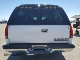 1999 Chevrolet Suburban with VIN 3GNEC16R0XG164600, listed as a Copart auction lot 49516445 with 105,747 mi miles and Salvage Title. Bid and sale history available at carsss.com. Image 6.