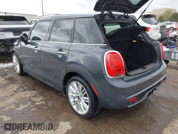 2017 MINI Hardtop 4 Door Cooper S z VIN WMWXU3C3XH2F49201, wystawiony jako IAAI lot #41837027 z przebiegiem 75 949 mil mil oraz . Historia ofert i sprzedaży dostępna na DreamBid. Obrazek 3.