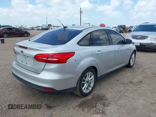 2015 Ford Focus SE with VIN 1FADP3F28FL205635, listed as a IAAI auction lot 42535860 with 135,994 mi miles and . Bid and sale history available at DreamBid. Image 4.