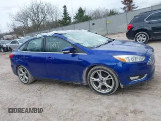 2015 Ford Focus Titanium with VIN 1FADP3J27FL298882, listed as a IAAI auction lot 42117247 with 124,185 mi miles and . Bid and sale history available at carsss.com. Image 13.