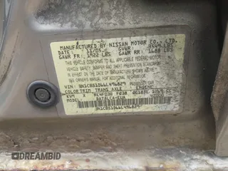 2006 Nissan Sentra S z VIN 3N1CB51D66L496829, wystawiony jako IAAI lot #42107673 z przebiegiem 118 671 mil mil oraz . Historia ofert i sprzedaży dostępna na DreamBid. Obrazek 9.
