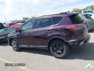 2017 Toyota RAV4 LE with VIN 2T3BFREV4HW580568, listed as a IAAI auction lot 42100704 with 157,300 mi miles and . Bid and sale history available at DreamBid. Image 14.
