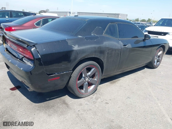 2013 Dodge Challenger SXT with VIN 2C3CDYAG9DH708717, listed as a IAAI auction lot 41990705 with 92,784 mi miles. Bid and sale history available at carsss.com. Image 4.