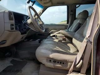 1999 GMC Denali with VIN 1GKEK13RXXR910328, listed as a Copart auction lot 71494384 with 251,016 mi miles and Salvage Title. Bid and sale history available at carsss.com. Image 7.