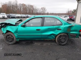 1995 Chevrolet Prizm LSi z VIN 1Y1SK5284SZ061266, wystawiony jako IAAI lot #41046644 z przebiegiem 204 029 mil mil oraz . Historia ofert i sprzedaży dostępna na DreamBid. Obrazek 13.