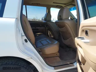 2007 Honda Pilot EX-L with VIN 5FNYF18777B002106, listed as a IAAI auction lot 42060765 with 202,276 mi miles. Bid and sale history available at carsss.com. Image 8.