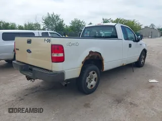 2005 Ford F-150 XL with VIN 1FTRF14W25NA18309, listed as a IAAI auction lot 42694465 with 242,618 mi miles and . Bid and sale history available at DreamBid. Image 4.