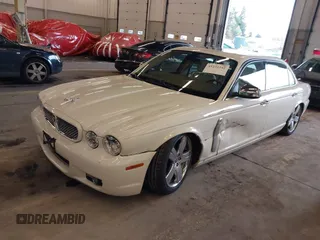 2008 Jaguar XJ Vanden Plas with VIN SAJWA82B28SH29030, listed as a IAAI auction lot 41231242 with 62,632 mi miles. Bid and sale history available at carsss.com. Image 2.