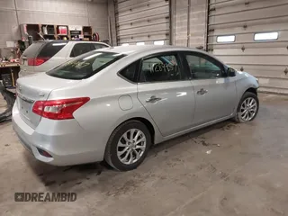 2019 Nissan Sentra S z VIN 3N1AB7AP7KY345072, wystawiony jako IAAI lot #41284957 z przebiegiem 104 084 mil mil oraz . Historia ofert i sprzedaży dostępna na DreamBid. Obrazek 4.
