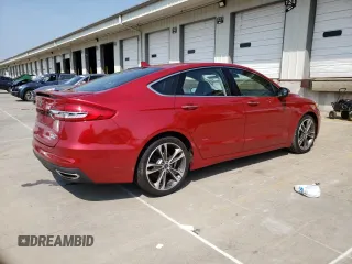 2020 Ford Fusion Titanium with VIN 3FA6P0K92LR164040, listed as a Copart auction lot 59497495 with 74,812 mi miles and Salvage title. Bid and sale history available at DreamBid. Image 3.