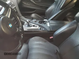 2015 BMW M6 z VIN WBSLZ9C58FD651420, wystawiony jako Copart lot #43480755 z przebiegiem 134 753 mil mil oraz Czysty tytuł • Clean title. Historia ofert i sprzedaży dostępna na DreamBid. Obrazek 8.