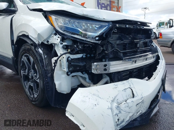 2018 Honda CR-V Touring with VIN 2HKRW1H96JH506435, listed as a IAAI auction lot 41228873 with 11,585 mi miles and . Bid and sale history available at DreamBid. Image 6.