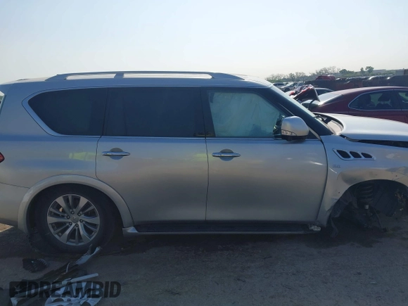 2017 Infiniti QX80 z VIN JN8AZ2NF0H9645147, wystawiony jako IAAI lot #42046252 z przebiegiem 98 759 mil mil oraz . Historia ofert i sprzedaży dostępna na DreamBid. Obrazek 14.