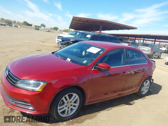 2017 Volkswagen Jetta S z VIN 3VW2B7AJ2HM207207, wystawiony jako IAAI lot #41654971 z przebiegiem 73 427 mil mil oraz . Historia ofert i sprzedaży dostępna na DreamBid. Obrazek 14.