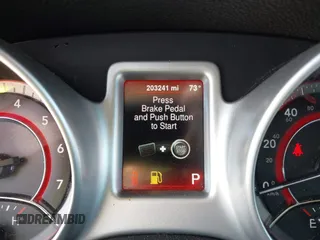 2014 Dodge Journey SE with VIN 3C4PDCAB0ET221998, listed as a IAAI auction lot 40609907 with 203,241 mi miles and . Bid and sale history available at carsss.com. Image 7.