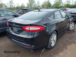 2014 Ford Fusion SE with VIN 1FA6P0H74E5392861, listed as a IAAI auction lot 42133099 with 130,373 mi miles. Bid and sale history available at carsss.com. Image 4.
