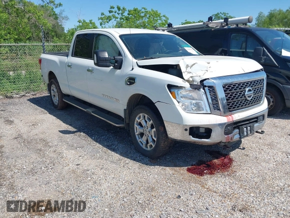 2018 Nissan Titan XD SV with VIN 1N6BA1F46JN526690, listed as a IAAI auction lot 41989215 with 129,626 mi miles. Bid and sale history available at carsss.com. Image 1.