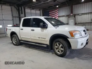 2010 Nissan Titan Pro-4X with VIN 1N6BA0EC3AN312601, listed as a Copart auction lot 52633455 with 161,260 mi miles and Salvage title. Bid and sale history available at DreamBid. Image 4.