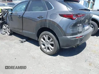 2021 Mazda CX-30 Select z VIN 3MVDMABL3MM233701, wystawiony jako IAAI lot #42086778 z przebiegiem Nie podano mil oraz . Historia ofert i sprzedaży dostępna na DreamBid. Obrazek 3.