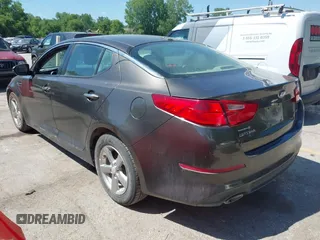 2015 Kia Optima LX z VIN 5XXGM4A77FG356930, wystawiony jako IAAI lot #42261299 z przebiegiem 248 635 mil mil oraz . Historia ofert i sprzedaży dostępna na DreamBid. Obrazek 3.