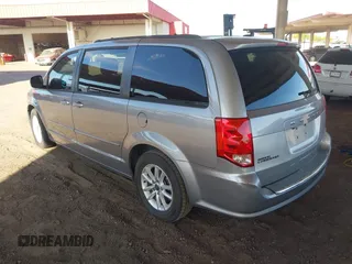 2016 Dodge Grand Caravan SXT with VIN 2C4RDGCG9GR323668, listed as a IAAI auction lot 42025601 with 125,351 mi miles and . Bid and sale history available at DreamBid. Image 3.