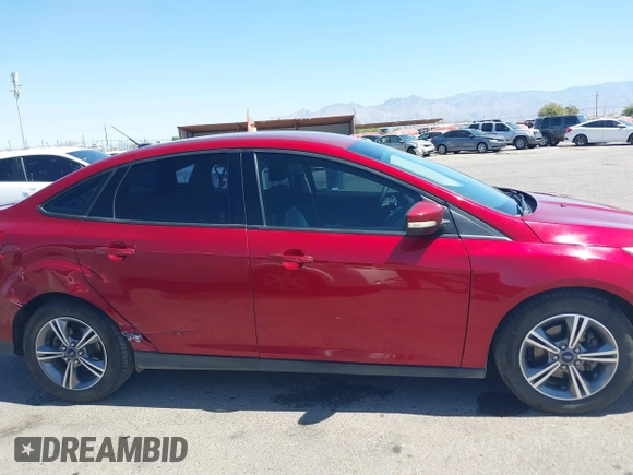 2017 Ford Focus SE with VIN 1FADP3FE3HL206074, listed as a IAAI auction lot 42594911 with 143,814 mi miles and . Bid and sale history available at DreamBid. Image 13.