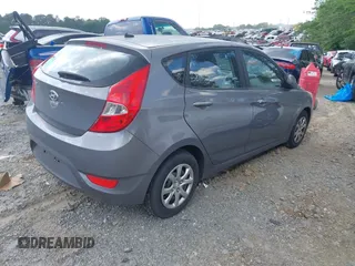2014 Hyundai Accent GS with VIN KMHCT5AE3EU141605, listed as a IAAI auction lot 42157550 with 174,197 mi miles. Bid and sale history available at carsss.com. Image 4.