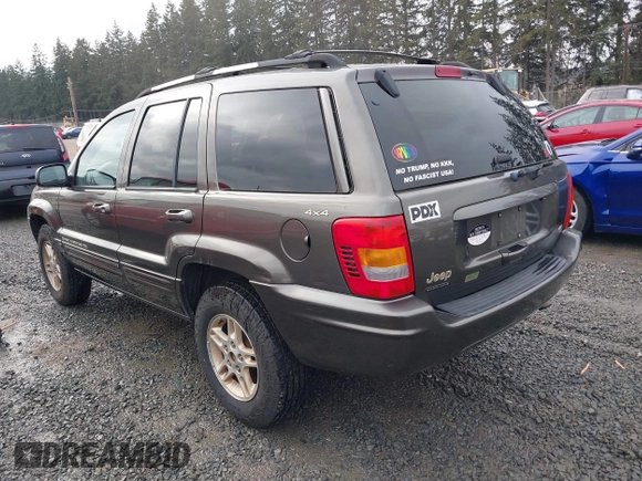 1999 Jeep Grand Cherokee Limited with VIN 1J4GW68N7XC739479, listed as a IAAI auction lot 41448323 with 129,840 mi miles. Bid and sale history available at carsss.com. Image 3.